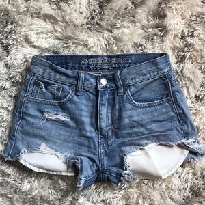 High rise light wash denim shorts.